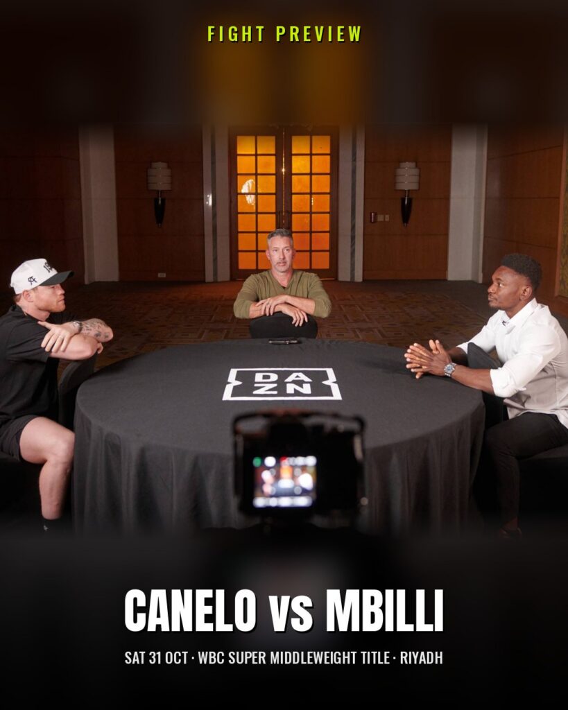 Canelo Álvarez and Christian Mbilli face each other across the table at the DAZN Face Off sit-down